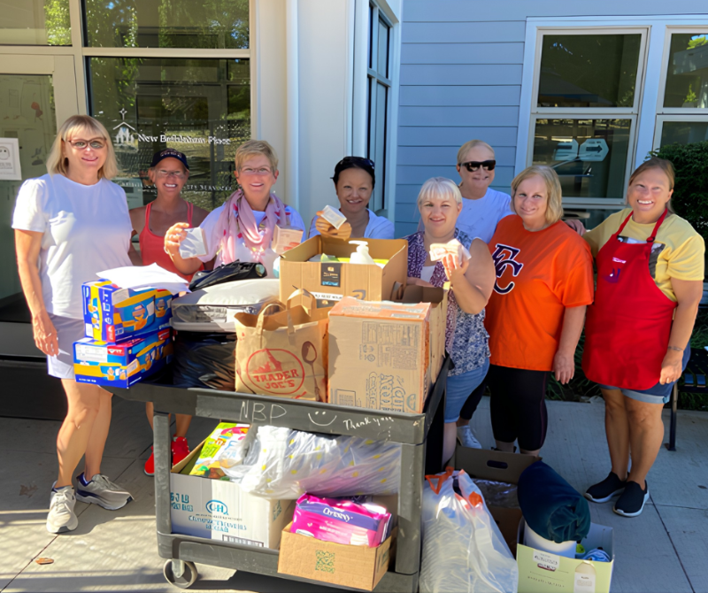 Members helping and donating at shelter
